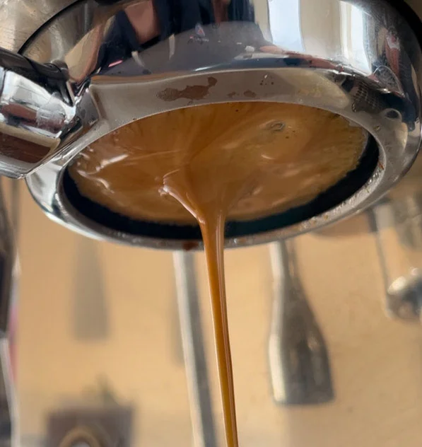 Extracting espresso coffee with perfect crema to create the ideal base ingredient for an espresso martini