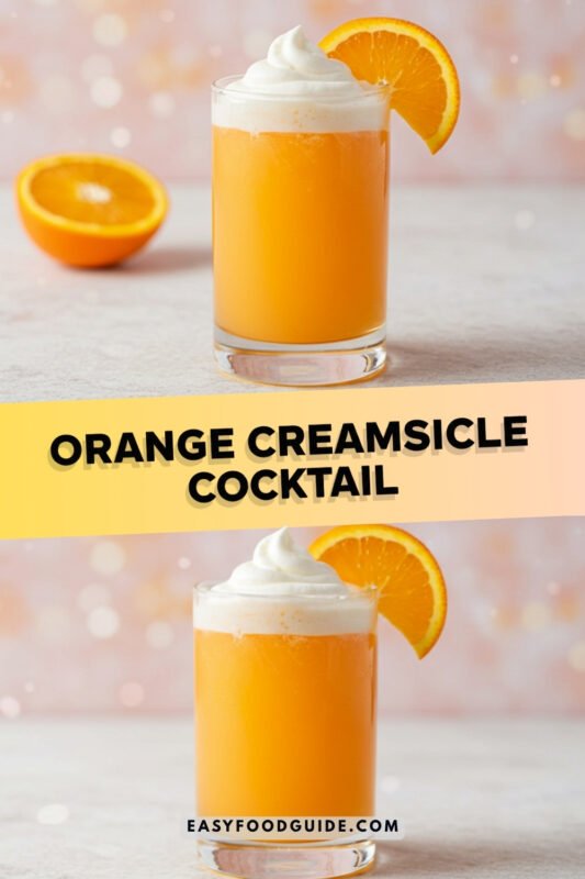 Orange Creamsicle Cocktail with whipped cream and orange slice on a pastel background.