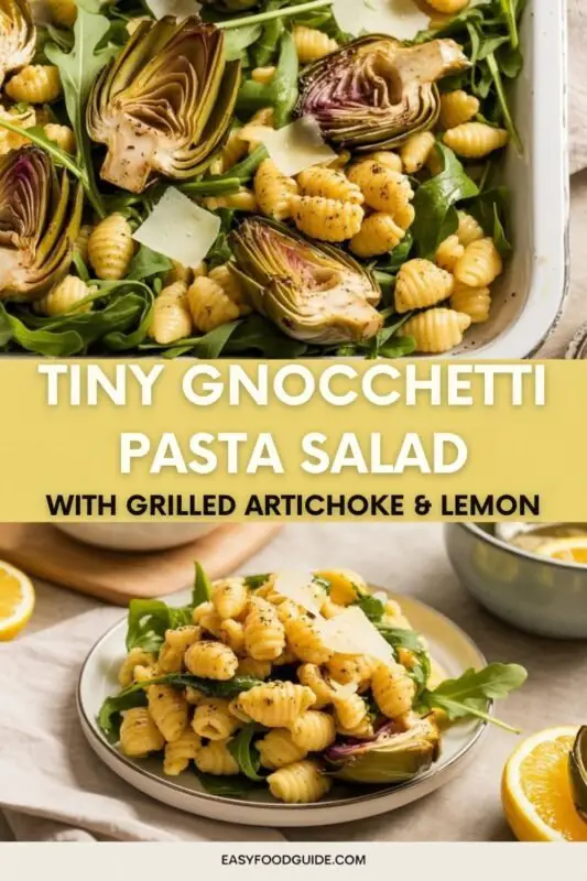 A colorful Tiny Gnocchetti Pasta Salad with grilled artichokes, arugula, and Parmesan on a rustic table.