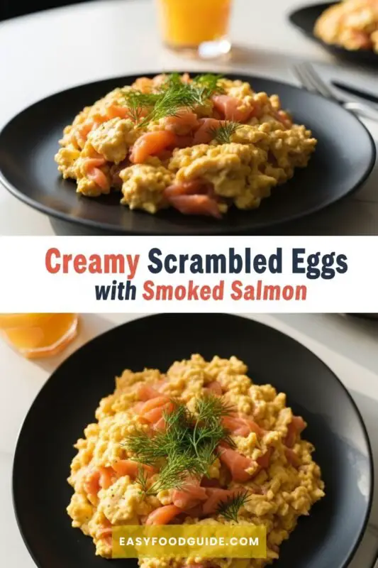 Soft scrambled eggs with smoked salmon and dill on a dark plate, with orange juice in the background.