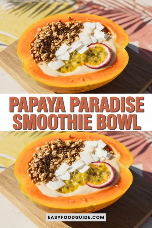 papaya-smoothie-bowl-1 A colorful papaya smoothie bowl in a halved papaya shell, garnished with coconut, passion fruit, and granola against a tropical background.