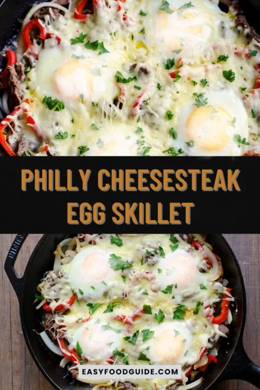 philly-cheesesteak-egg-1 A Philly Cheesesteak Egg Skillet with eggs, beef, onions, and provolone cheese, garnished with parsley on a wooden table.