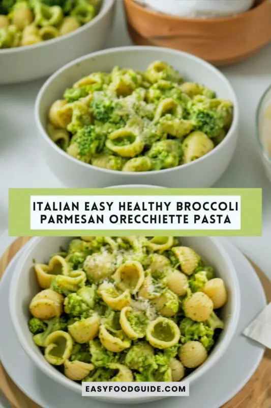 Orecchiette pasta with roasted broccoli and Parmesan cheese, garnished with lemon and red pepper flakes on a wooden table.