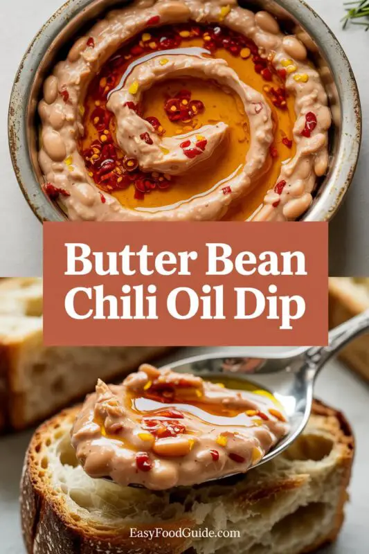 A creamy Butter Bean Chili Oil Dip in a bowl, topped with chili oil and herbs, served with vegetable sticks and pita chips.