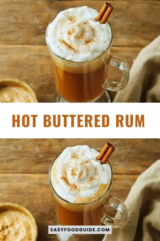 hot-buttered-rum-1 A warm mug of Hot Buttered Rum with whipped cream and cinnamon, on a rustic table.