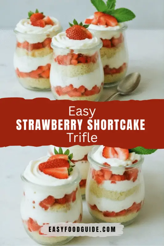 strawberry-shortcake-trifle-1 A layered strawberry shortcake trifle with strawberries, whipped cream, and cake in a glass dish, garnished with mint leaves.