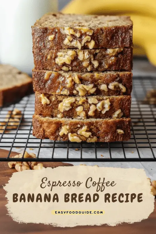 A slice of espresso coffee banana bread on a wooden board with a steaming cup of coffee in the background.