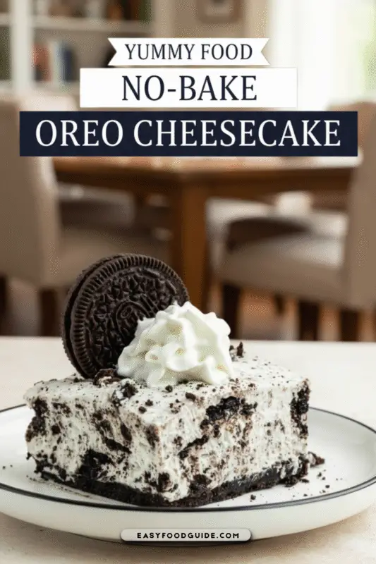 No-Bake Oreo Cheesecake Bars topped with whipped cream and Oreo crumbs on a white plate.