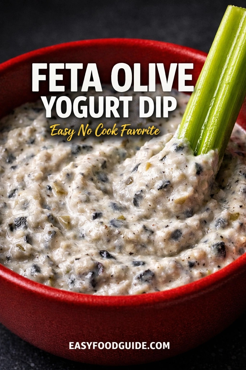 A close-up of a feta olive yogurt dip, an easy no cook favorite, served in a red bowl. A celery stalk is dipped into the creamy, speckled mixture against a dark background. Text reads "FETA OLIVE YOGURT DIP Easy No Cook Favorite," and the website "EASYFOODGUIDE.COM" is at the bottom.