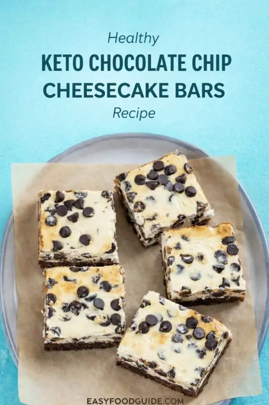 Five chocolate chip cheesecake bars sit on a round plate lined with parchment paper. Text above reads "Healthy Keto Chocolate Chip Cheesecake Bars Recipe."