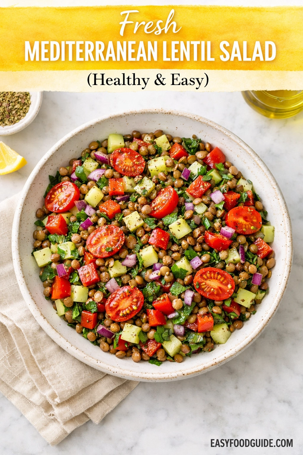 A top-down photograph on a dark, aged metal sheet pan filled with caramelized, roasted sausage slices, golden-brown cauliflower florets, and scattered broccoli, all garnished with fresh parsley. Prominent text at the top reads: "Crispy KETO SAUSAGE & CAULIFLOWER Sheet Pan Dinner" in white and yellow font. At the bottom center, the website "EASYFOODGUIDE.COM" is visible. The scene is set on a dark wooden surface.