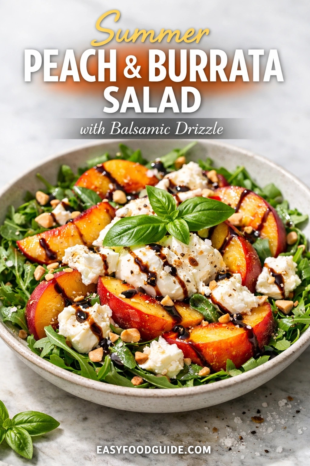 A summer peach & burrata salad with balsamic drizzle, served in a rustic bowl over a bed of arugula. The dish is topped with fresh basil, chopped nuts, and a dark glaze on a marble surface. Text reads "Summer PEACH & BURRATA SALAD with Balsamic Drizzle," and the website "EASYFOODGUIDE.COM" is at the bottom.
